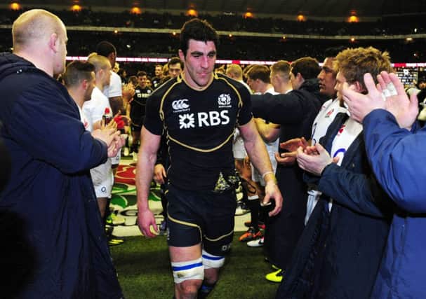 Kelly Brown leads Scotland off after defeat at Twickenham two years ago. Picture: Ian Rutherford