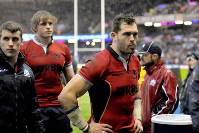 Dejected Scotland trudge off after Italy defeat. Picture: Jane Barlow