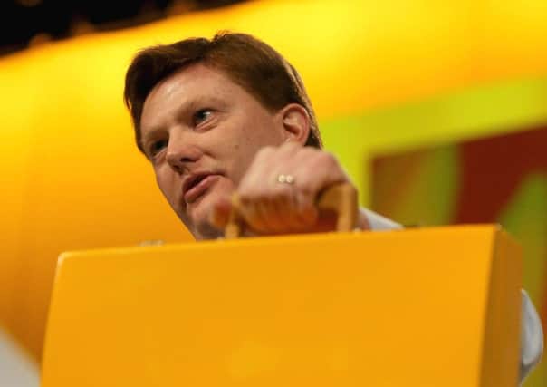 Danny Alexander with the Lib Dems budget box at the spring conference. Picture: Getty