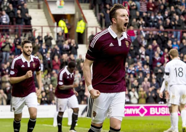 Hearts captain Danny Wilson celebrates after scoring his side's second goal. Picture: SNS