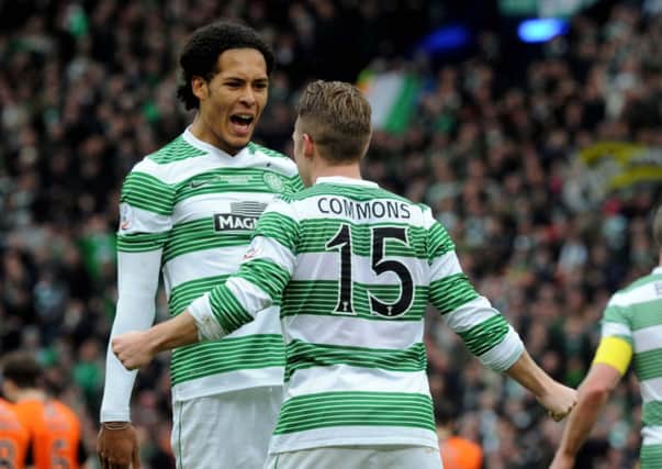 Virgil Van Dijk and Kris Commons celebrate after the latter opened the scoring. Picture: Lisa Ferguson
