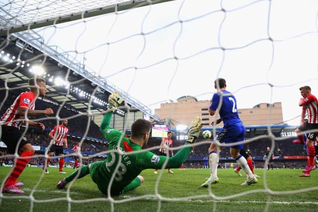 Southampton goalkeeper Fraser Forster saves a late effort by John Terry. Picture: Getty