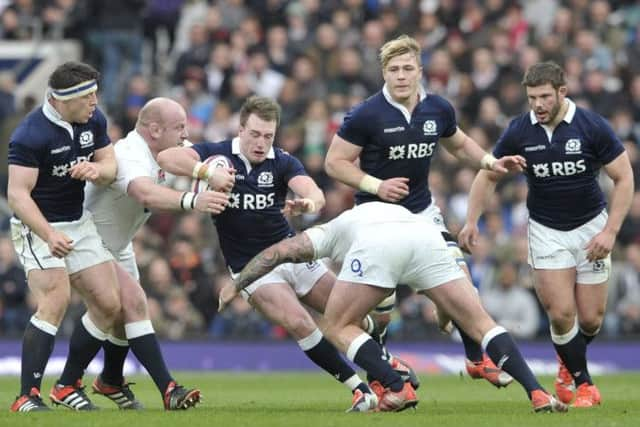 Scotland full-back Stuart Hogg has his progress halted at Twickenham. Picture: Ian Rutherford