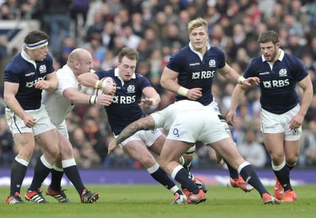 Scotland full-back Stuart Hogg has his progress halted at Twickenham. Picture: Ian Rutherford
