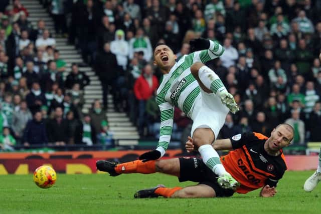 Dundee United captain Sean Dillon was sent off for this lunge at Emilio Izaguirre. Picture: Lisa Ferguson