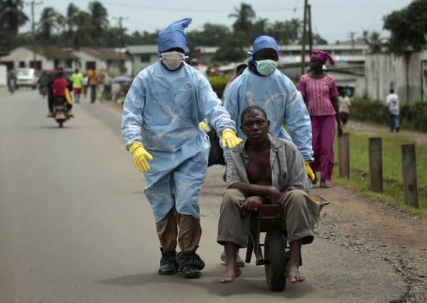 Doctors, aid workers and military leaders will mark the UK's contribution to tackling Ebola. Picture: AP