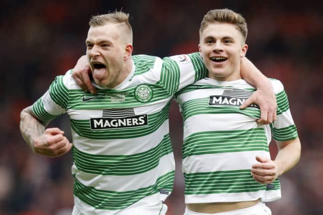 John Guidetti celebrates with James Forrest after the Scot doubled Celtic's lead. Picture: PA