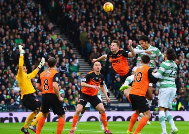 Virgil van Dijk of Celtic heads at goal during the Scottish League Cup Final between Dundee United and Celtic at Hampden Park. Picture: Getty