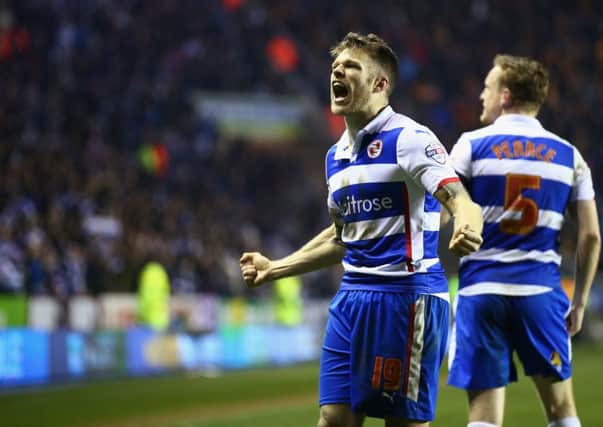 Reading's Scots striker Jamie Mackie celebrates scoring his side's third goal. Picture: Getty