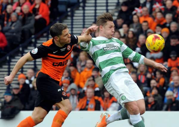 John Rankin, left, has said Dundee United are undeterred by their defeats to Celtic. Picture: Lisa Ferguson