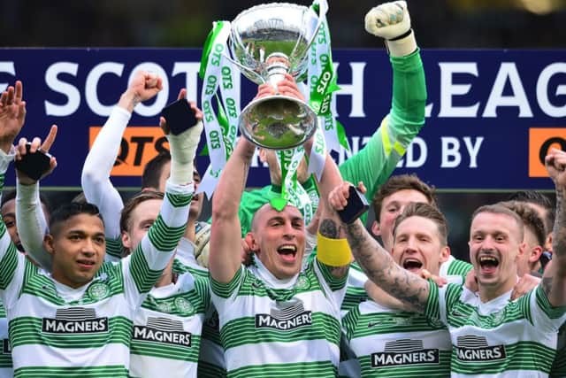 Celtic captain Scott Brown lifts the League Cup trophy. Picture: Getty