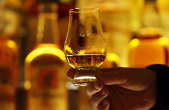 Alcohol duty on whisky is to be cut by 2 per cent. Picture: PA