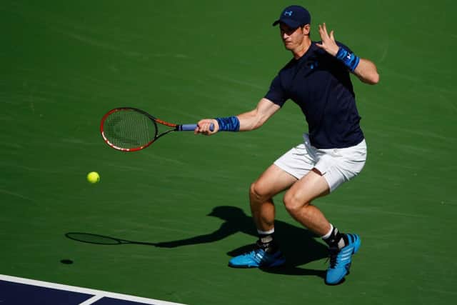 Andy Murray plays a forehand on his way to a straight-sets win over Adrian Mannarino. Picture: Getty