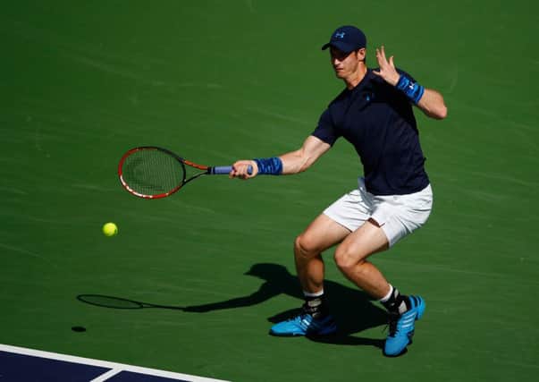 Andy Murray plays a forehand on his way to a straight-sets win over Adrian Mannarino. Picture: Getty