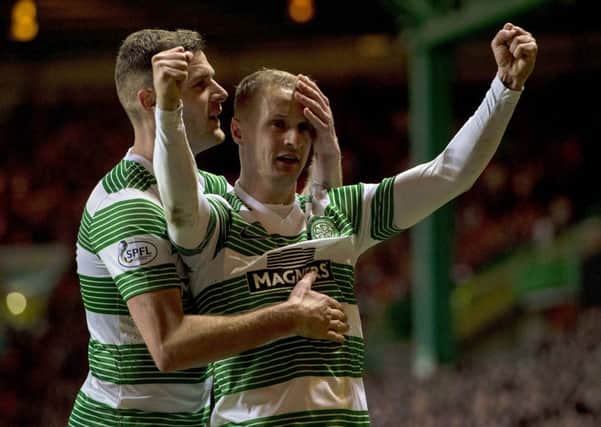 Celtic's Leigh Griffiths celebrates after putting his side 2-0 up. Picture: SNS