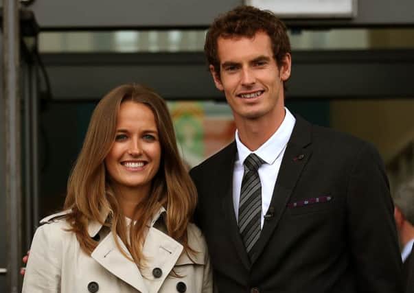 Andy Murray with fiancee Kim Sears. The two dogs have been named after the pair. Picture: PA