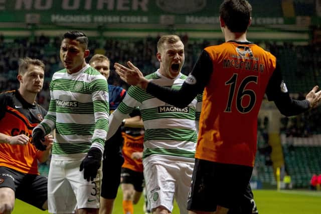 John Guidetti squares up to Ryan McGowan after his challenge on Liam Henderson. Picture: SNS
