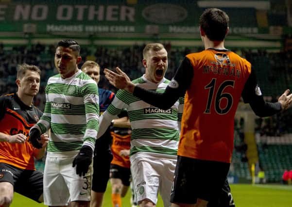 John Guidetti squares up to Ryan McGowan after his challenge on Liam Henderson. Picture: SNS