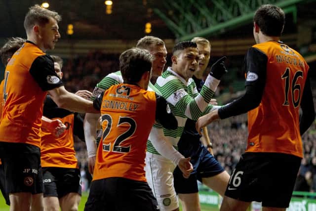 Tempers fray at Celtic Park after Ryan McGowan's challenge on Liam Henderson. Picture: SNS