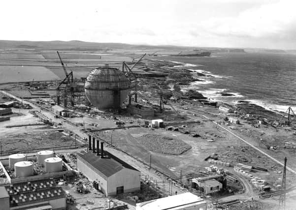 Work goes on to build the distinctive dome at Dounreay. Picture: TSPL
