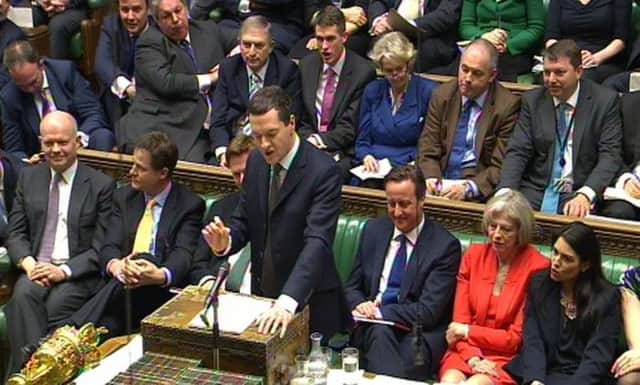 George Osborne delivers his Budget. Tory hopes of winning the election rest on the slightly better off. Picture: PA