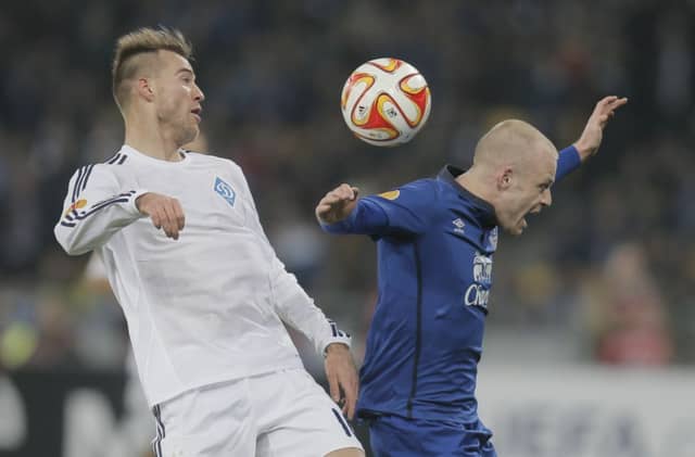 Andriy Yarmolenko of Dynamo Kyiv, left, and Steven Naismith during the last 16 encounter. Picture: AP
