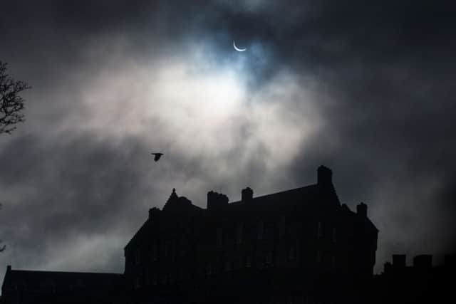 The eclipse over Edinburgh Castle. Picture: HEMEDIA