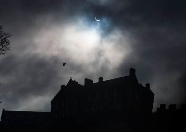 The eclipse over Edinburgh Castle. Picture: HEMEDIA