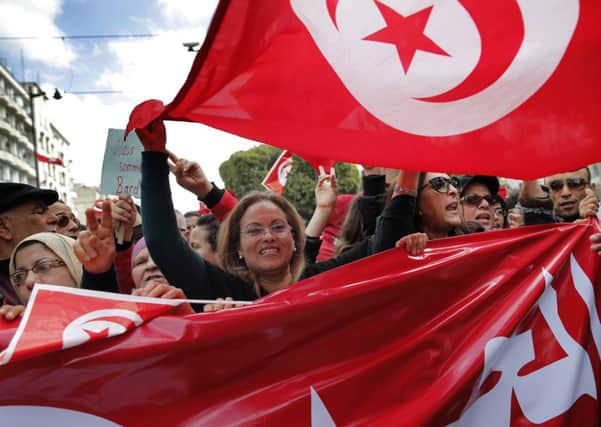 Tunisians rallied at the National Bardo Museum to proclaim their support for democracy. Picture: AP