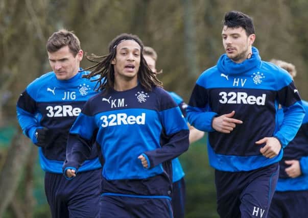 Kevin Mbabu and Haris Vuckic are put through their paces at Murray Park. Picture: SNS