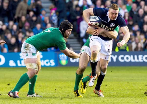 Scotland's Dougie Fife (right) is tackled by Sean O'Brien (left) and Jared Payne. Picture: SNS