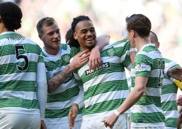 Celtic's Jason Denayer is all smiles as he increases the lead for his side. Picture: SNS