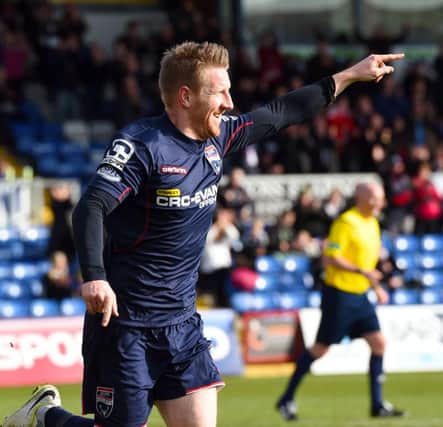 Ross County's Michael Gardyne wheels away after putting his side 1-0 up. Picture: SNS