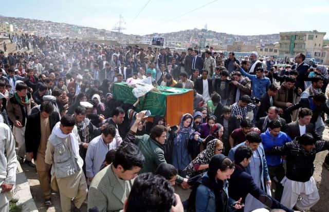 Afghan women rights activists carry the coffin of 27-year-old Farkhunda to her funeral. Picture: AP