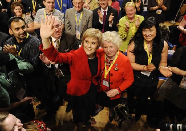 Nicola Sturgeon is applauded by the faithful. Party membership has quadrupled to 100,000. Picture: Greg Macvean
