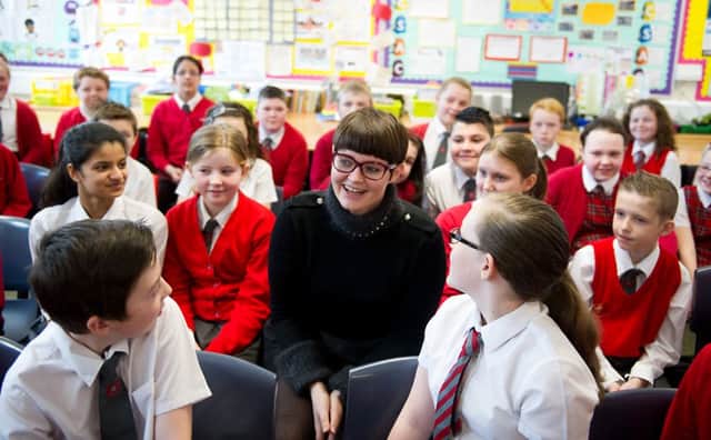 Cara Henderson talks to the children of St Blane's Primary. Picture: John Devlin