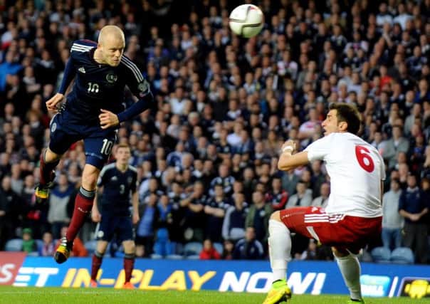 Steven Naismith powers a header at goal in Scotland's qualifier against Georgia in October 2014. Picture: Lisa Ferguson