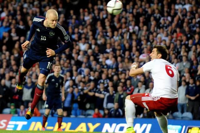 Steven Naismith powers a header at goal in Scotland's qualifier against Georgia in October 2014. Picture: Lisa Ferguson