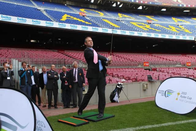 Tim Hunt, of Ryder Cup Europe, tees off in the Nou Camp at the launch of Spain's bid.