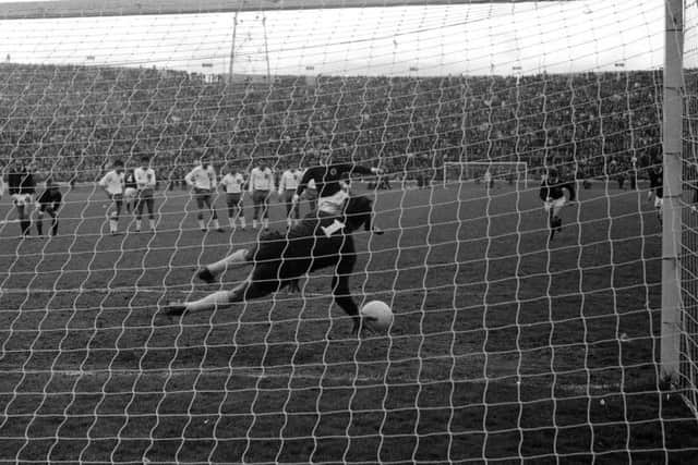 Tommy Gemmell denies Colin Stein the chance to score a fifth goal against Cyprus as he sends a penalty kick past the goalkeeper