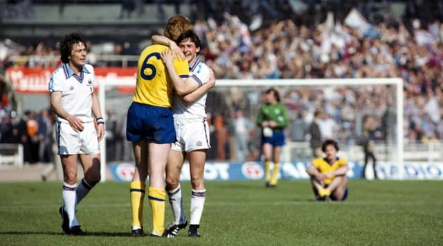 Young congratulates Paul Allen in the controversial cup final. Picture: Getty
