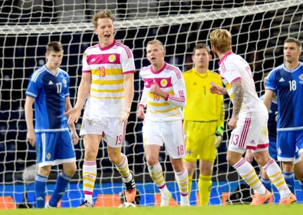 Christophe Berra celebrates his late goal. Picture: SNS