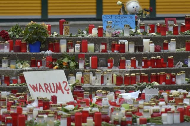Tributes placed in front of the Joseph-Koenig Gymnasium in Haltern, Germany. Picture: AP