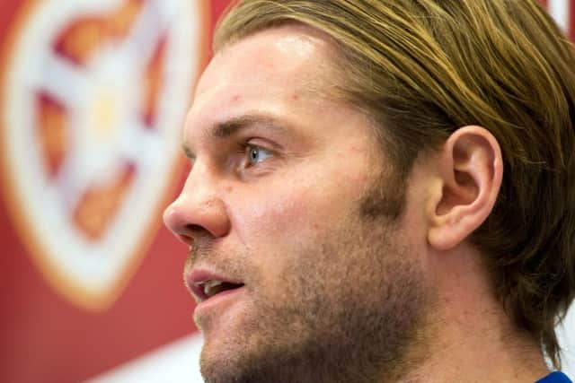Robbie Neilson's success in leading Hearts to promotion in his first season in charge has led to speculation. Picture: SNS