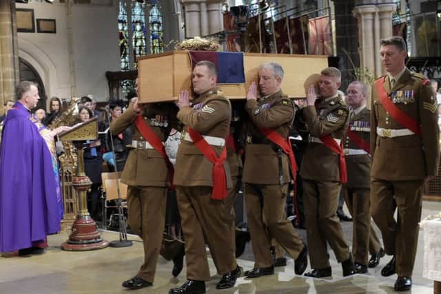 The coffin of Richard III is carried by the military bearer party during a reburial service at Leicester Cathedral. Picture: PA