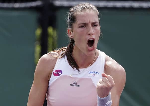 Andrea Petkovic reacts after breaking serve against Christina McHale in Miami. Picture: Lynne Sladky/AP