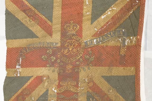 Two regimental colours carried into the battle of Waterloo by the Royal Scots.