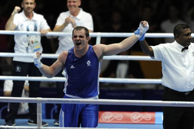 Stephen Lavelle celebrates beating Kody Davies on his way to Commonwealth Games bronze. Picture: Andrew OBrien