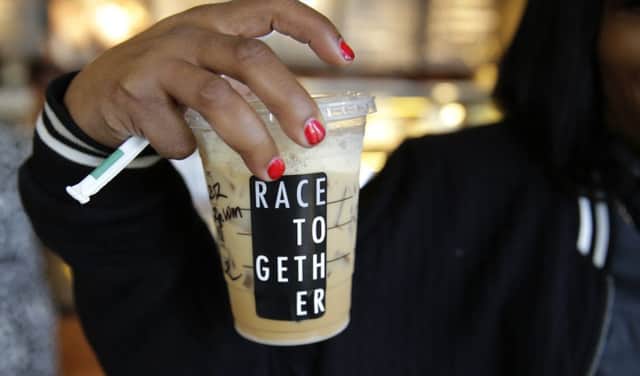 Starbucks baristas will no longer write "Race Together" on customers' cups. Picture: AP