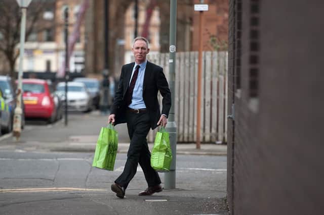 Scottish Labour leader Jim Murphy delivers supplies to a Glasgow foodbank